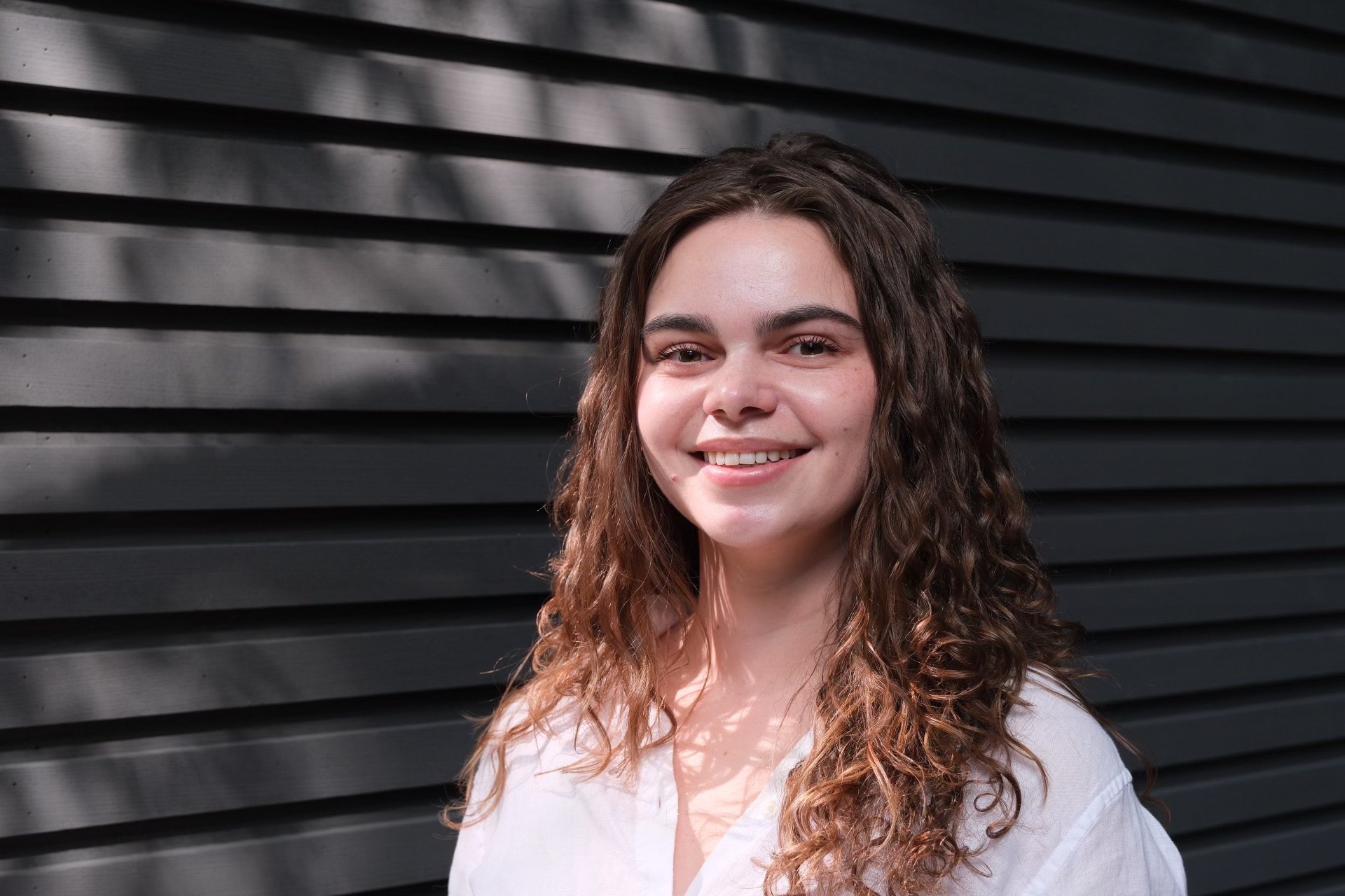 A photo of a woman outside.